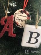 img 1 attached to Personalized Christmas Engagement Ornament 2022 - Perfect Wedding Gift For Couples, Beautifully Decorate Your Home - 3" Red Ornament With Custom Engraving review by Roberto Garrido