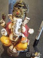 img 1 attached to Marble Powder Lord Ganesh Ganpati Elephant Hindu God Statue: The Blessing, Colored & Enhanced With Gold, Handcrafted In India By Lightahead review by Robert Grind