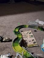 img 1 attached to 159 Pcs Dinosaur Glow In The Dark Race Train Track Toy For Boys & Girls Ages 3-7 | DinoManiacs By JitteryGit review by Timothy Johnson