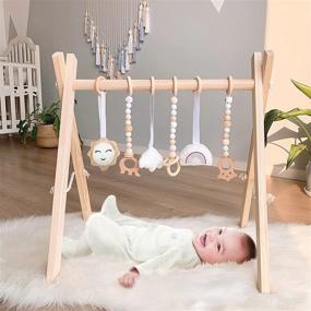 img 4 attached to 👶 WOOD CITY Foldable Wooden Baby Play Gym: Enhance Infants' Senses with 6 Hanging Sensory Toys, Perfect Baby Gift for Boys and Girls (Natural Wood)