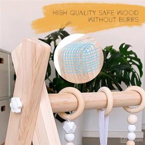 img 1 attached to 👶 WOOD CITY Foldable Wooden Baby Play Gym: Enhance Infants' Senses with 6 Hanging Sensory Toys, Perfect Baby Gift for Boys and Girls (Natural Wood)