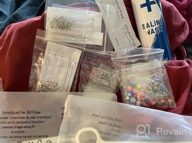 img 1 attached to Complete Body Piercing Kit With Aftercare Spray And Diverse Jewelry Mix - 156 Pieces For Belly, Nose, Tragus, Cartilage, And More - 14G To 20G review by Sonya Oberembt