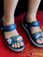 img 1 attached to Crocs Bayaband Sandal Lemonade Little Boys' Shoes review by Ryan Brady