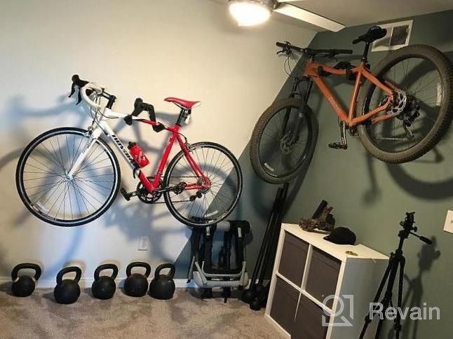 img 1 attached to Vibrelli Bike Wall Mount: Horizontal Storage Rack For Hanging Bicycles In Home Or Garage - Adjustable Hooks For Mountain, Road & Hybrid Bikes review by Marklen Baeskens