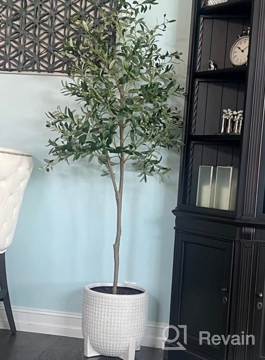 img 1 attached to Artificial Olive Tree - 5.25Ft Tall Faux Potted Silk Tree With Planter, Large Olive Branch And Fruit Decoration, Indoor Home Decor For Modern Living Spaces, 1032 Leaves review by John Blanco