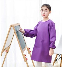 img 3 attached to 2-Pack Long-Sleeved Kids Art Smocks With Pockets For Painting, Gardening & Eating