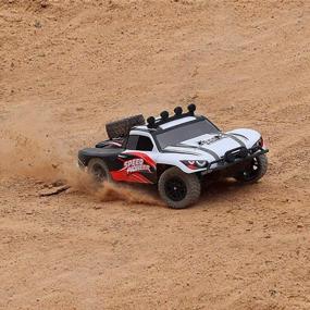 img 4 attached to Remote Control Car 1/18 Scale 2.4 Ghz High Speed 30+ MPH 4X4 Off Road RC Truck With LED Lights - Great For Adults & Kids By FUNTECH
