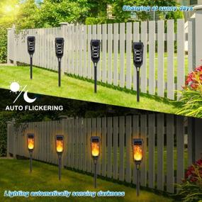 img 2 attached to 8-Pack Waterproof Solar Tiki Torches With Flickering Flame For Outdoor Christmas Decorations, Yard Pathway Patio Garden - Decorative LED Mini Torch Lights By KYEKIO