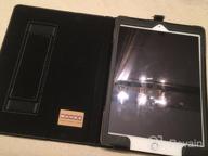 img 1 attached to Snugg IPad Air 2 Leather Smart Cover Case With Kick Stand And Built-In Stand - Black review by Eric Trask