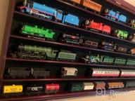img 1 attached to Securely Display & Protect Your HO Scale Model Train Collection With UV Cabinet Wall Rack review by Robert Hines