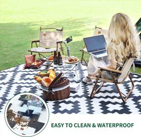 img 3 attached to RVGUARD Reversible Outdoor Rug: 9 X 18 Ft Waterproof Mat For Camping, Picnic, Beach & Backyard In Black & White - Perfect For Patio, RV & Deck