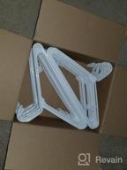 img 1 attached to Hangorize 60 Standard Everyday White Plastic Hangers, Long Lasting Tubular Clothes Hangers, Value Pack Of 60 Clothing Hangers. (60 Pack) review by David Forleo