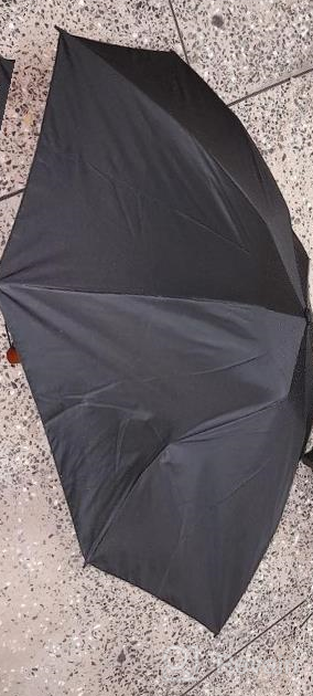 img 1 attached to Compact Windproof Travel Umbrella With Light Blue Inverted Design, Perfect For Backpacking: Durable Wooden Handle, Inside-Out Functionality And Backpack Rain Protection. review by Trey Angus