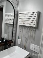 img 1 attached to Black Wall Mounted Jewelry Organizer With 117 Holes And 12 Hooks For Earrings, Necklaces, And Bracelets - Display Hanger By JackCubeDesign (16.54 X 12.2 X 0.75 Inches) review by Adrianne Jimenez