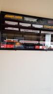 img 1 attached to Securely Display & Protect Your HO Scale Model Train Collection With UV Cabinet Wall Rack review by Steven Chiumento