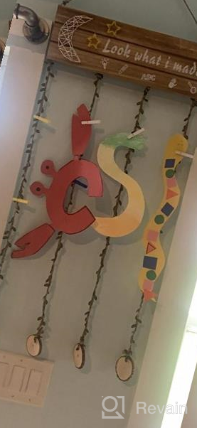 img 1 attached to 🎨 Hanging Artwork Display for Kids: Look What I Made Sign with 20 Clips and Remote Fairy Lights review by Aaron Fowler