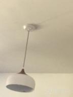 картинка 1 прикреплена к отзыву Tomons Modern Lantern Pendant Light With LED Bulb - Wood Pattern Dome Industrial Ceiling Hanging Lamp For Kitchen Island, Dining Room, And Bedroom In Sleek Black Finish от Bob Candfield