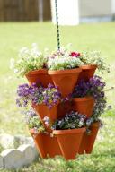 maximize your strawberry yield with mr. stacky's 5-tier planter pot - 5 pots to grow even more! logo