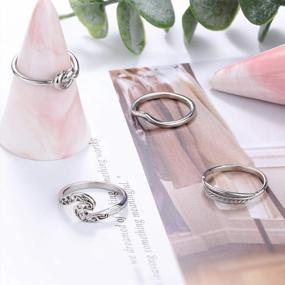 img 1 attached to Set Of 4 Stackable Stainless Steel Rings For Women - Knot And Wave Design, Simple And Cute Thumb Ring Collection In Sizes 4-11 By LOLIAS