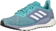 women's adidas athletic shoes in solar silver metallic for enhanced performance logo