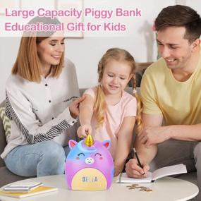 img 3 attached to Magical Unicorn Piggy Bank For Girls With Stickers And Bracelet - Durable And Spacious Money Saving Solution For Kids