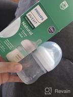 img 1 attached to Philips AVENT Glass Natural Baby Bottle With Natural Response Nipple, Clear, 4Oz, 1Pk, SCY910/01 review by Mary Medema