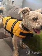 img 1 attached to HAOCOO Dog Life Jacket Vest: Reflective Stripes, Adjustable Belt, Safety Swimsuit Preserver - Blue Bone Design (Size S) review by Yvonne Mok