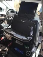 img 1 attached to Tsumbay Car Backseat Organizer - PU Leather With Tablet Holder, Foldable Table Tray, And 9 Storage Pockets review by Kyle Fritz