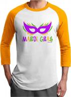 boisterous mardi gras raglan shirt with purple, gold, and green mask print for adults by tooloud logo