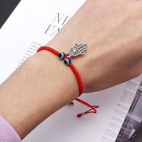 img 1 attached to Adjustable Braided Evil Eye Pendant Bracelet Anklet With Hand, Turtle And Elephant Charms For Men And Women In Red, Blue And Black Lines - Fashion Jewelry