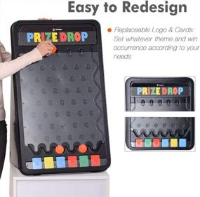 img 2 attached to Win Big With WinSpin 30 Prize Drop Plinko Board Game - Customizable 6 Slots & 10 Pucks (19"X30")