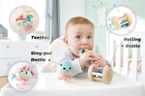 img 3 attached to 🎁 Hape Multi-Stage Sensory 5-Piece Wooden Gift Set: Stay Put Rattle, Rolling Rattles, and Teether; Montessori Toys for Newborns, Crawling Babies, and Walking Toddlers