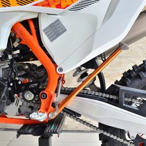 img 3 attached to 🟧 Premium NICECNC Orange Shortened Side Stand Kickstand for KTM & Husqvarna 125-500 Series - Enhanced Stability & Easy Compatibility 2008-2022