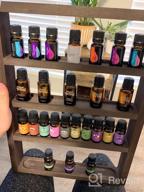 img 1 attached to Rustic Grey White Wall Mounted Essential Oil Display Shelf Rack For Essential Oils And Nail Polish - LIANTRAL Essential Oil Storage Solution review by Leslie Wallace