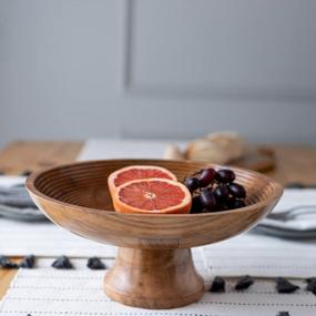 img 1 attached to Natural Acacia Wood Fruit Bowl - Large 12-Inch Decorative Pedestal Bowl For Rustic Or Farmhouse Kitchen Decor, Ideal For Serving And Displaying Fruit On Countertops, By Folkulture Wood.