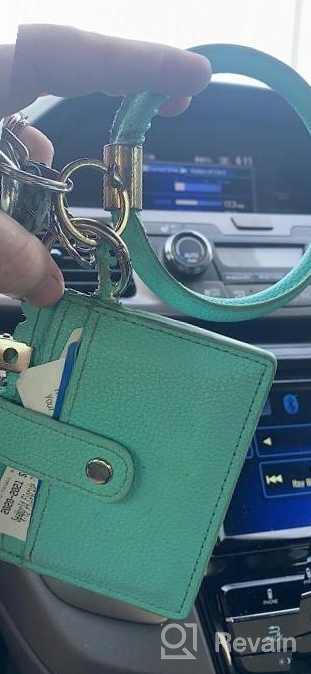 img 1 attached to Stay Stylishly Organized With Coolcos Portable Wristlet Bracelet Wallet Keychain review by Joshua Beaule