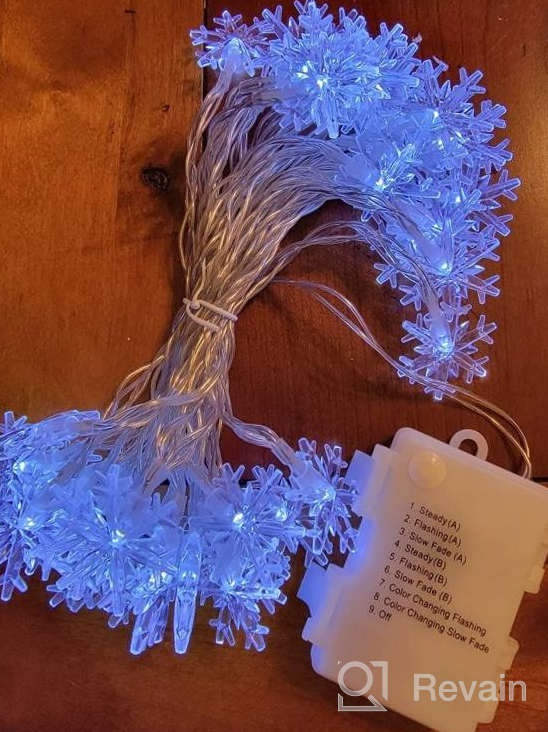 img 1 attached to WesGen Snowflake Battery-Operated Christmas String Lights - 40 LED Fairy Lights For 20Ft Waterproof Decorations In Warm White review by Shawn Trotter