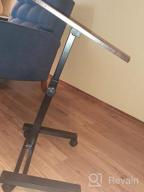 img 1 attached to Portable Laptop Desk Cart With Height Adjustability: Tatkraft Dream 23.6X15.7'', Wheels & Stoppers, Black review by Gary Ferguson