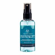 revitalize your feet with the body shop peppermint cooling and refreshing foot spray, 3.3oz. логотип