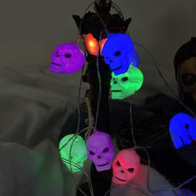 img 2 attached to Multi-Color Battery-Operated Skull String Lights With Remote - 30 LED Halloween Fairy Lights For Indoor/Outdoor Party Decorations, Waterproof 8 Modes - Illuminew 16.4Ft