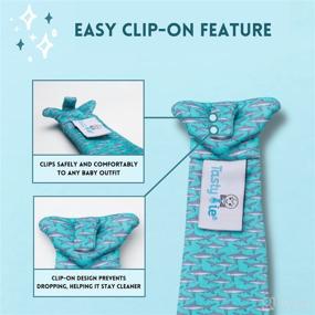 img 2 attached to Tasty Tie Baby Teething Tie: 3-in-1 Clip-on, Crinkle Toy & Silicone Teether for Infants - Machine Washable Chew Toy, Fish Style