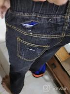 img 1 attached to Stylish and Trendy: SHOOYING Boys' Ripped Holes Denim Jeans - Perfect Pants for an Edgy Look! review by Jazz Rajasingam