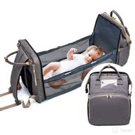 👶 foldable baby bed diaper bag backpack: 3-in-1 travel bassinet, portable changing station, and mummy bag logo