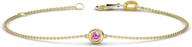 stunning 14k gold minimalist bracelet with 1/10 ct pink sapphire solitaire station logo