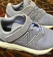 картинка 1 прикреплена к отзыву Увеличенный комфорт и поддержка: кроссовки New Balance FuelCore Running для маленьких девочек и спортивная одежда. от Jennifer Martin