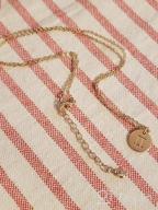 img 1 attached to Stunning Befettly Constellation Necklace: 14K Gold-Plated Zodiac Pendant with Engraved Disc - Adjustable, Dainty 16.5’’ Necklace review by Donna Hoff