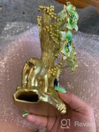img 1 attached to Turkish Blue Evil Eye Gold Fortune Tree Home Decor With Elephant Figurine And Green Flowers review by Tracy Anderson