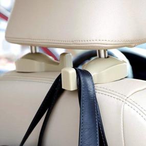 img 1 attached to Beige Car Headrest Hooks, Set Of 2 Vehicle Back Seat Hanger Holder For Purse Bag Cloth Grocery
