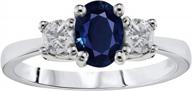 1.15ctw genuine diamond and oval sapphire 3 stone ring in 14k white gold by voss+agin logo