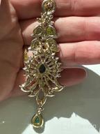 img 1 attached to Exquisite 'Touchstone Hollywood Glamour Oscar Collection' Indian Paisley Motif Designer Bridal Jewelry: Long Chandelier Earrings in Antique Gold and White Tone for Women review by Chris Rob